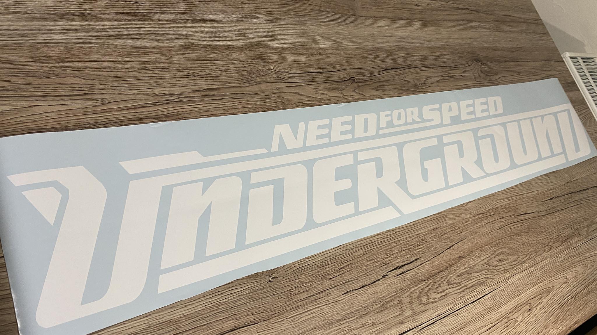 Řezaná samolepka logo NFSU